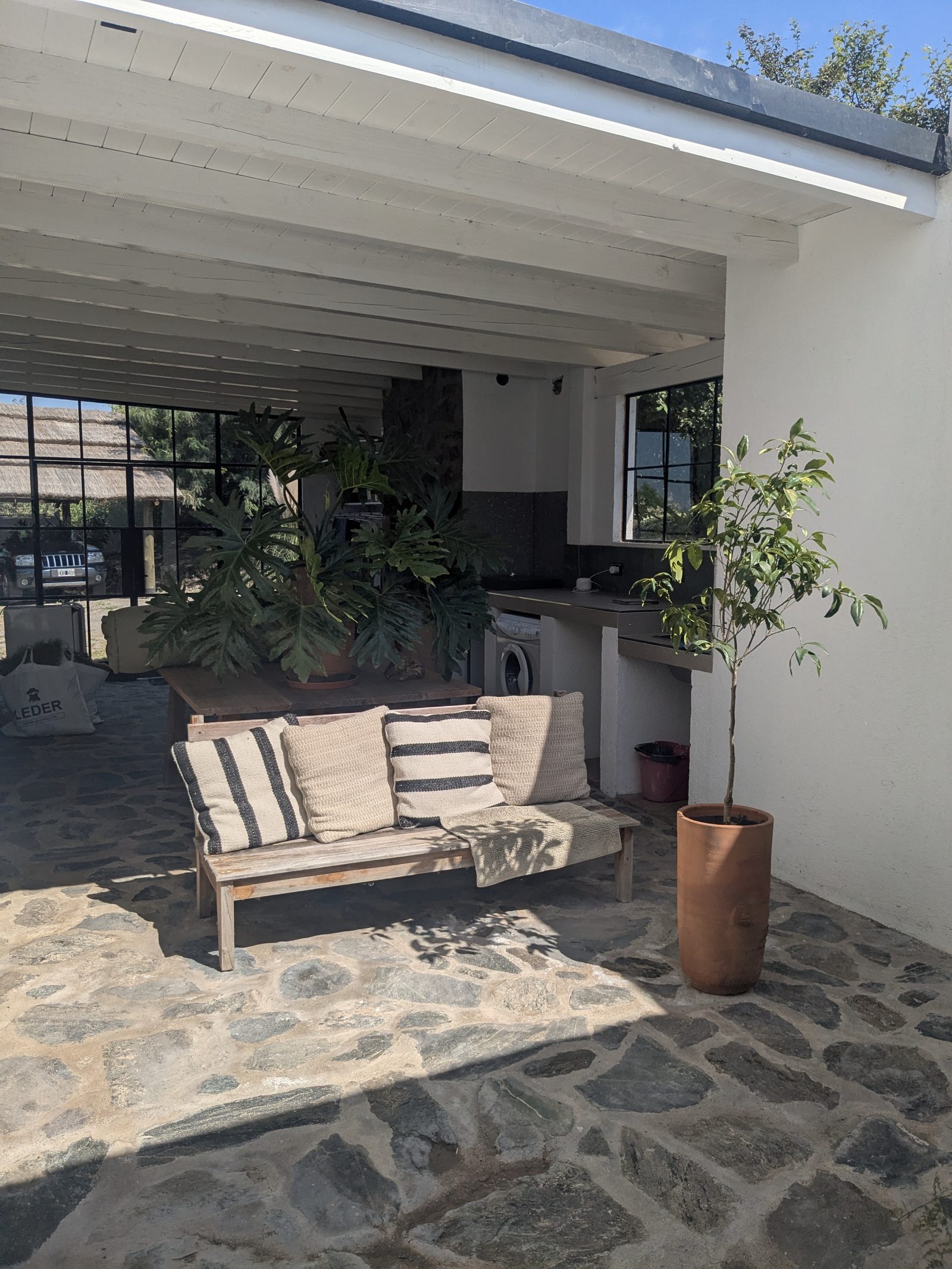 Quincho terrace with stone floor